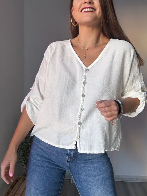 camisa blanca botones
