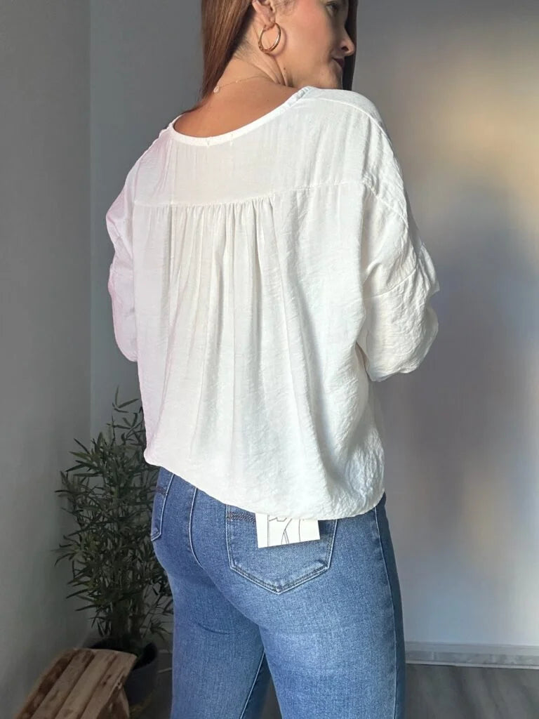 camisa blanca botones