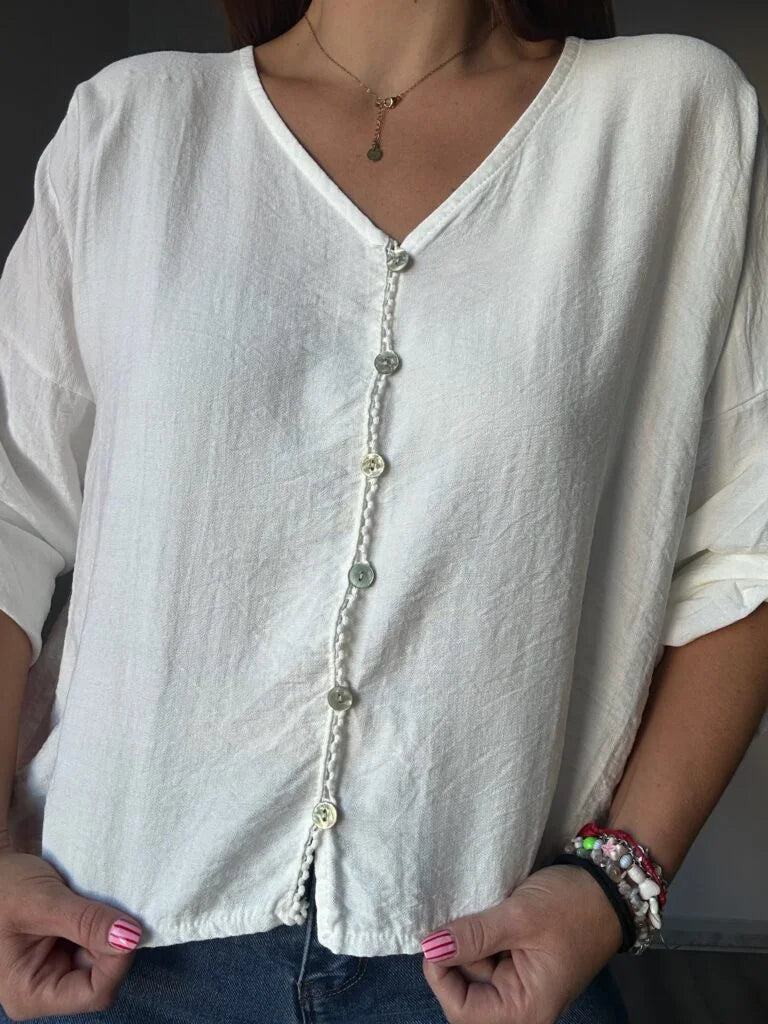 camisa blanca botones